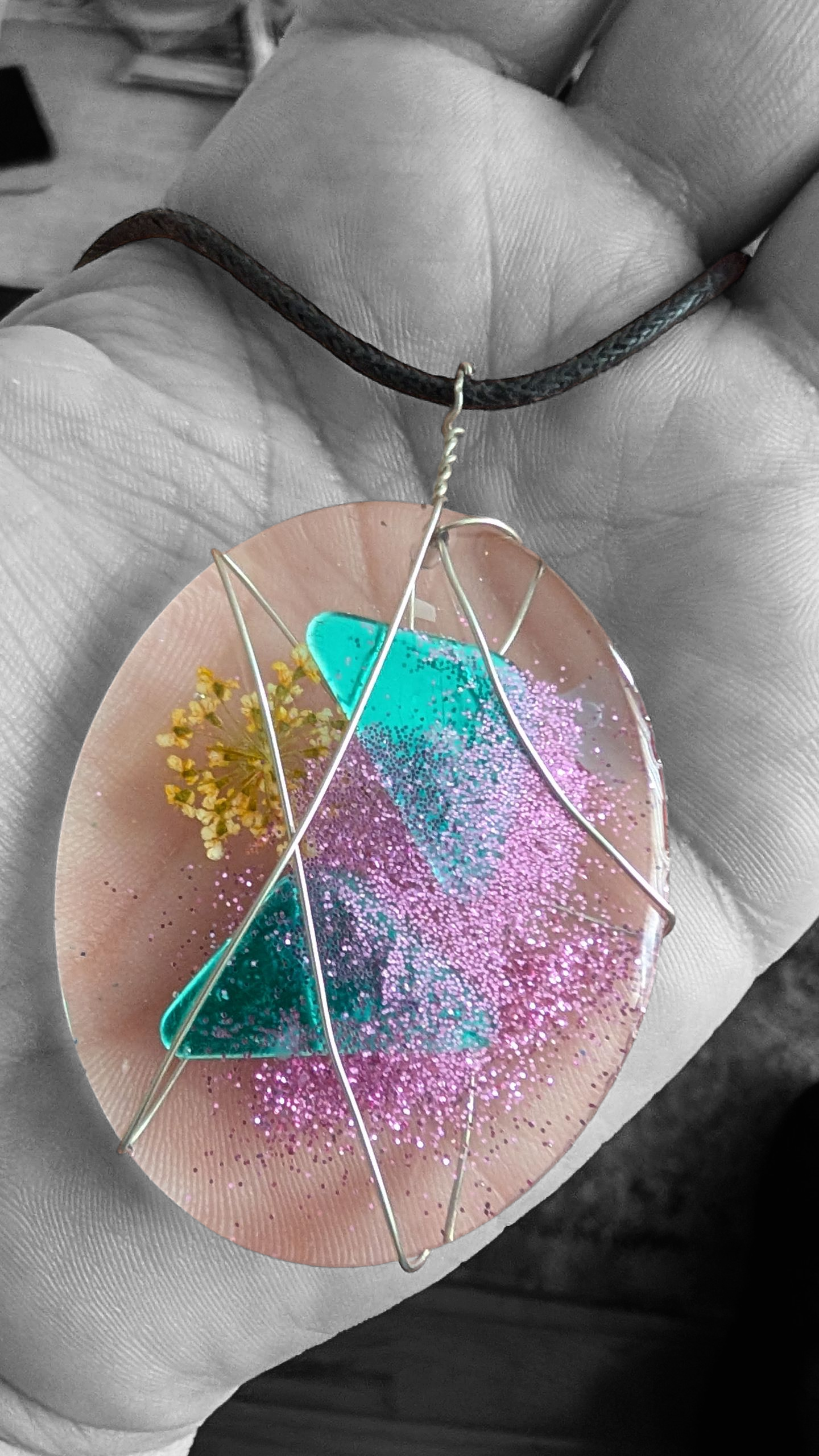 Oval abstract pendant on black cord